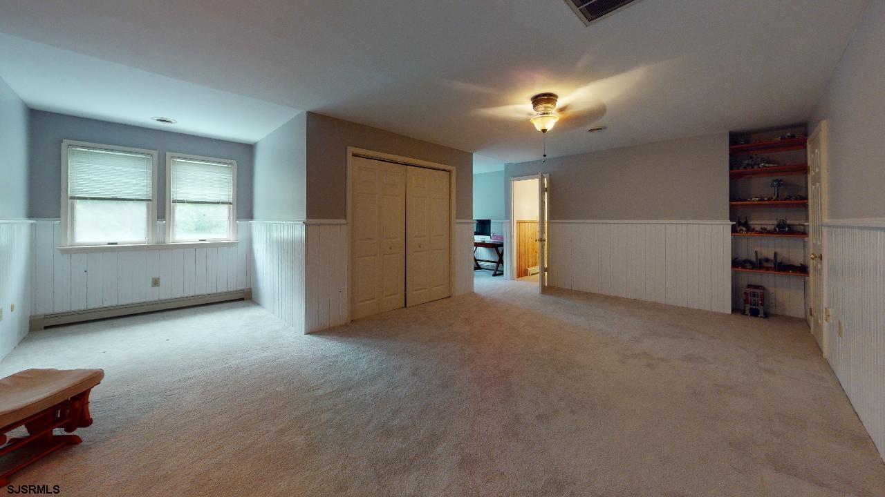 9 Edward Terrace Ocean View, NJ 08230 - Photo 15 of 30 an empty room with windows and cabinet