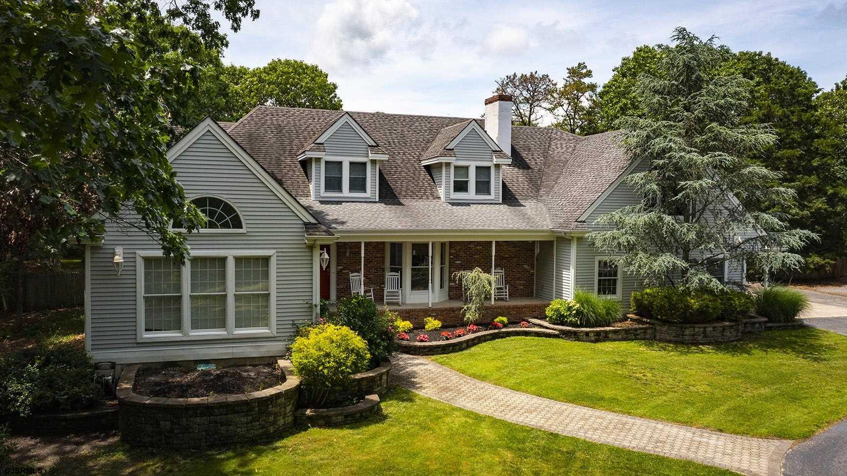 9 Edward Terrace Ocean View, NJ 08230 - Photo 5 of 30 a front view of a house with patio