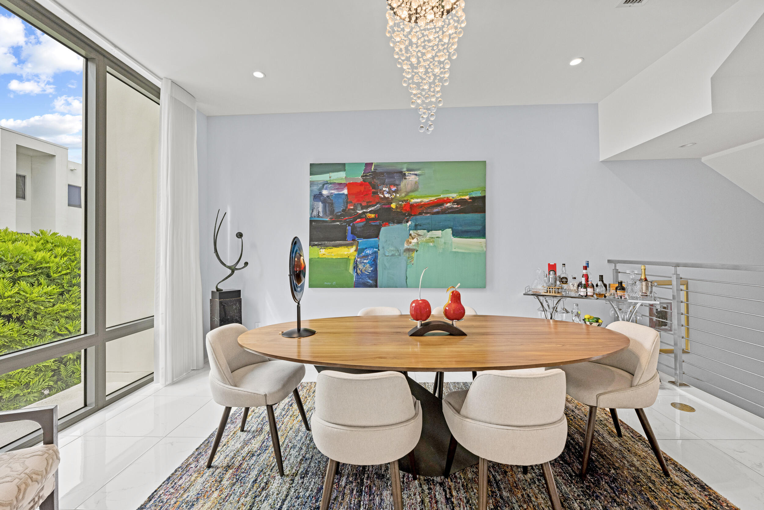 1811 Northwest 42nd Drive Boca Raton, FL 33431 - Photo 20 of 51 a view of a dining room with furniture and a potted plant