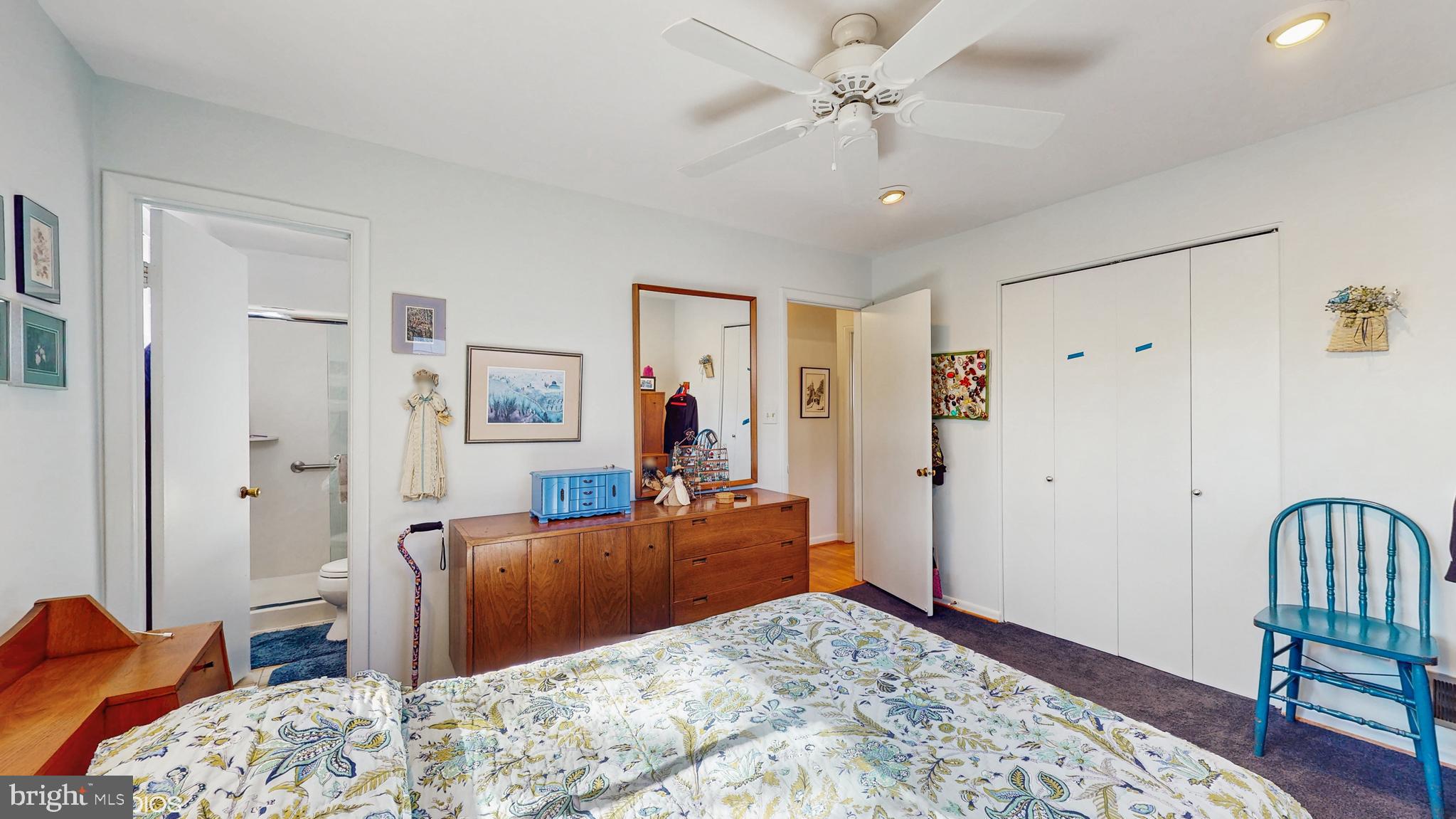 906 Malta Lane Silver Spring, MD 20901 - Photo 12 of 35 a bedroom with a bed and a dresser
