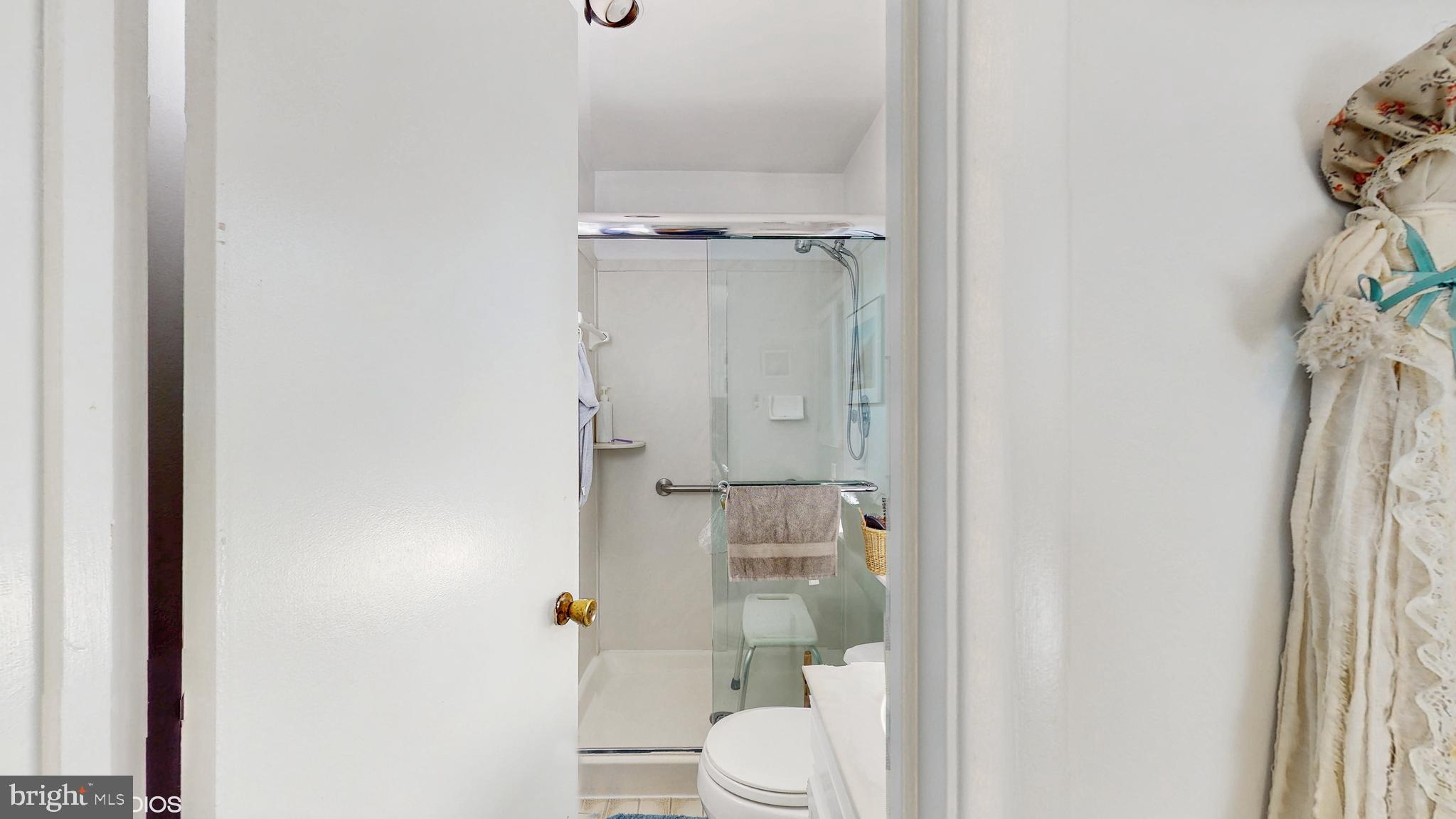 906 Malta Lane Silver Spring, MD 20901 - Photo 14 of 35 a bathroom with a toilet and a shower