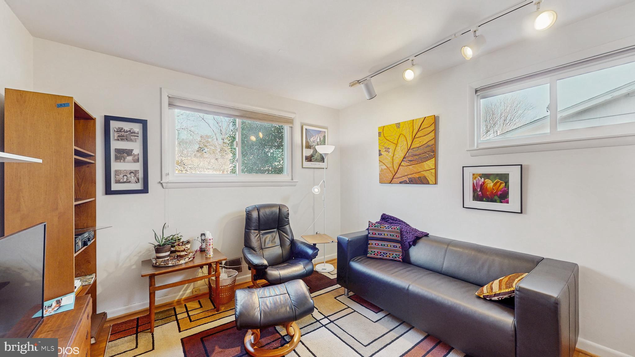 906 Malta Lane Silver Spring, MD 20901 - Photo 15 of 35 a living room with furniture and a window