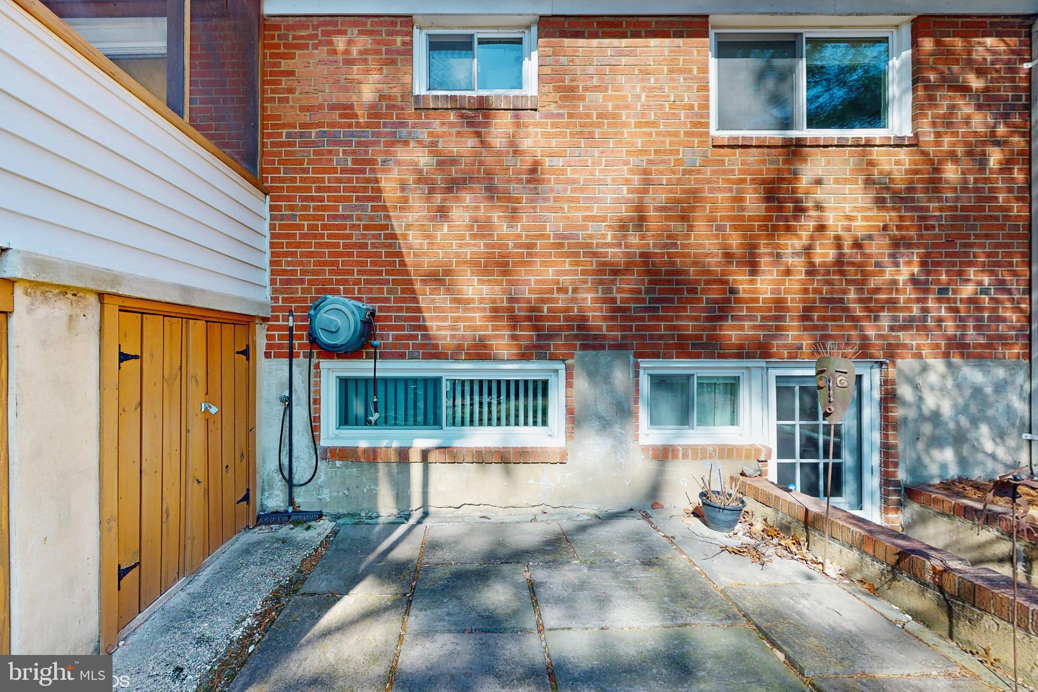 906 Malta Lane Silver Spring, MD 20901 - Photo 30 of 35 a view of a house with a patio