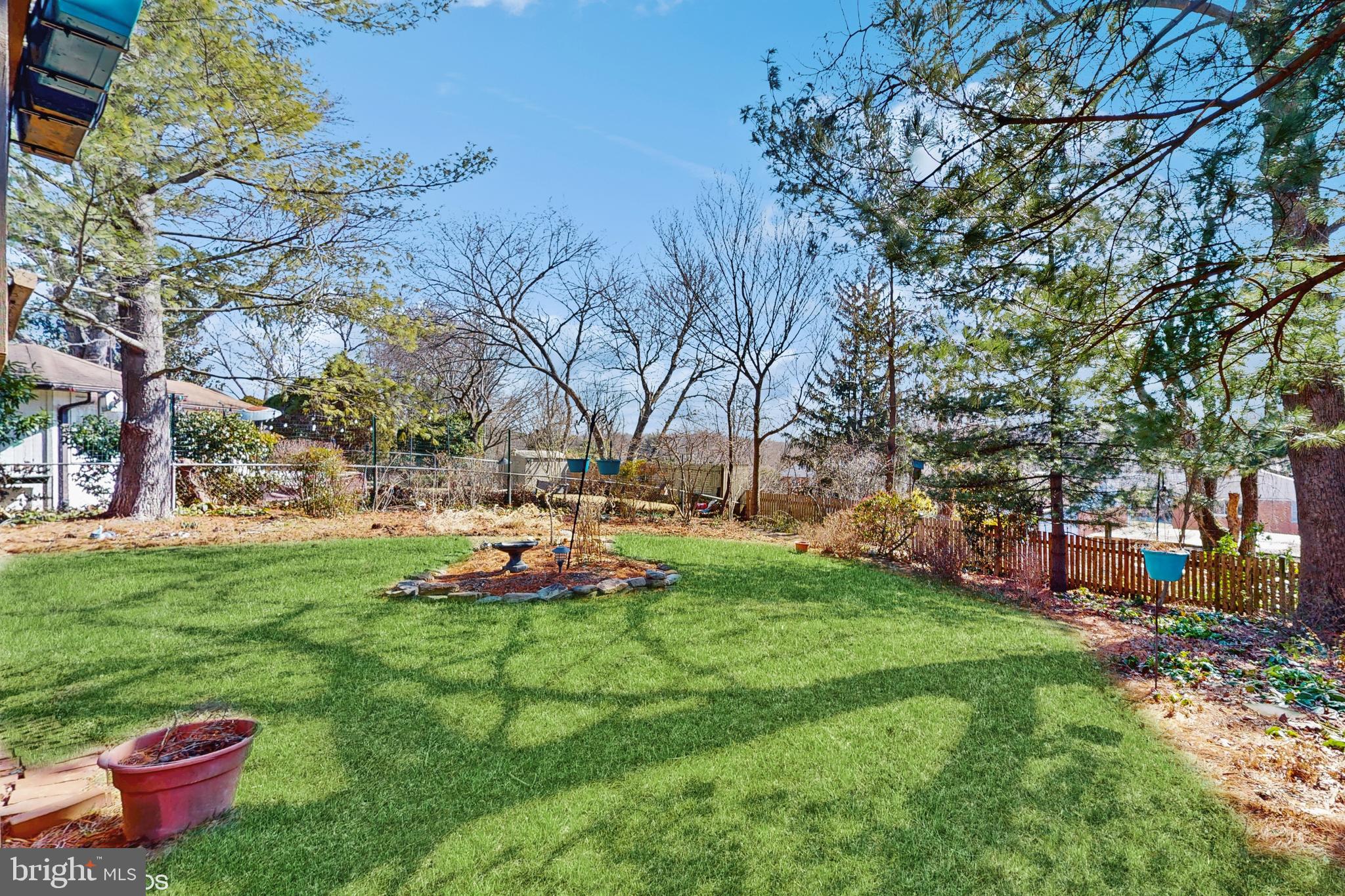 906 Malta Lane Silver Spring, MD 20901 - Photo 31 of 35 a view of a backyard with sitting area