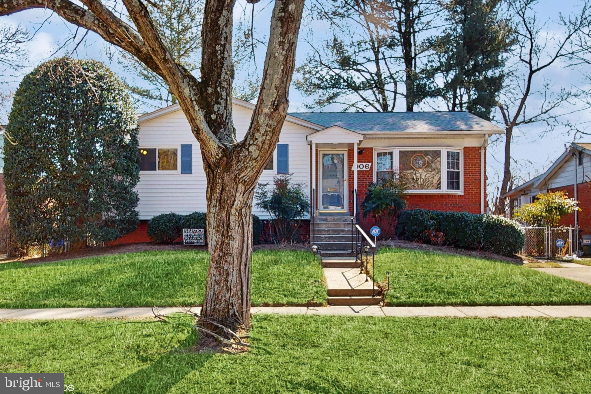 906 Malta Lane Silver Spring, MD 20901 - Photo 32 of 35 front view of a house with a yard