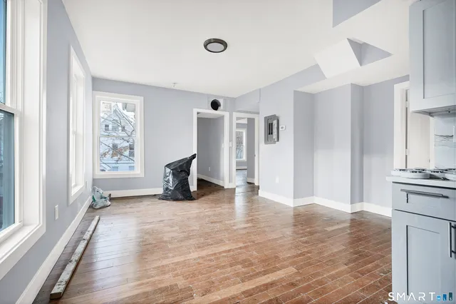a view of kitchen with wooden floor
