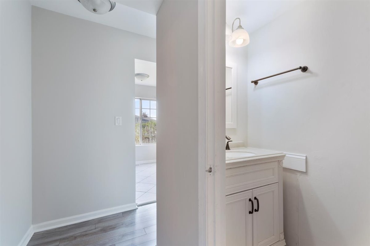 1171 Longford Road Bartlett, IL 60103 - Photo 11 of 22 a bathroom with a sink and a mirror