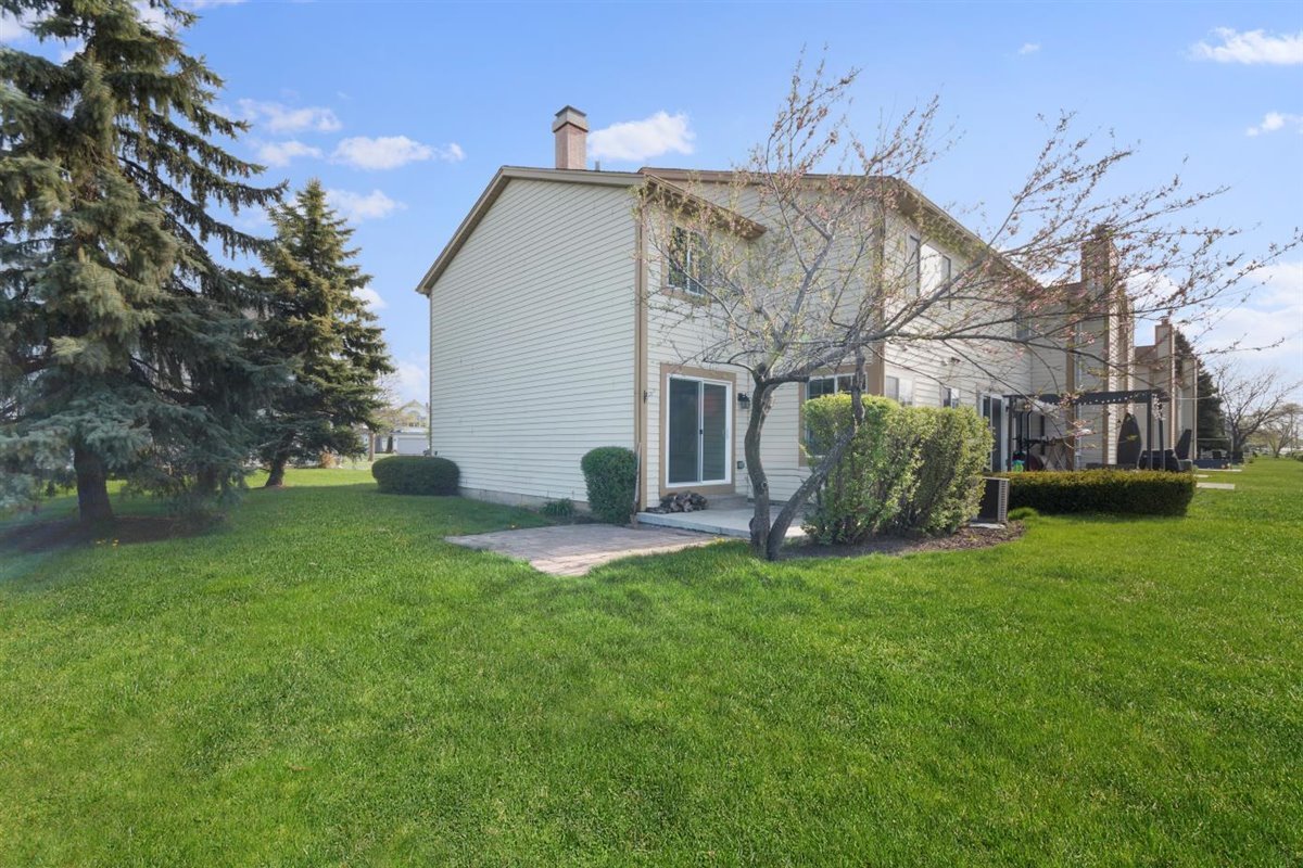 1171 Longford Road Bartlett, IL 60103 - Photo 21 of 22 a view of a house with a yard