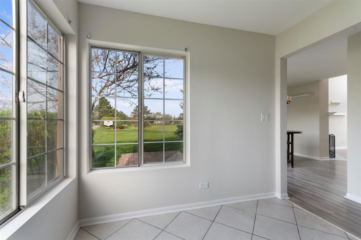1171 Longford Road Bartlett, IL 60103 - Photo 7 of 22 a view of livingroom with furniture and front door