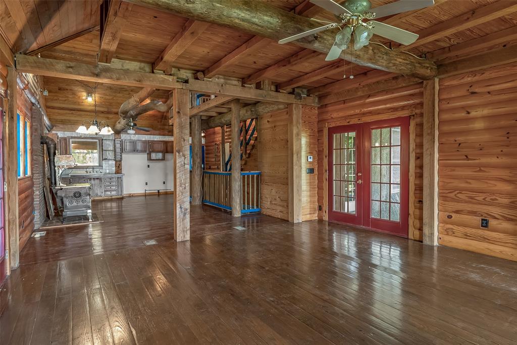 223 Razorback Lane Homer, LA 71040 - Photo 14 of 37 a view of an empty room with wooden floor