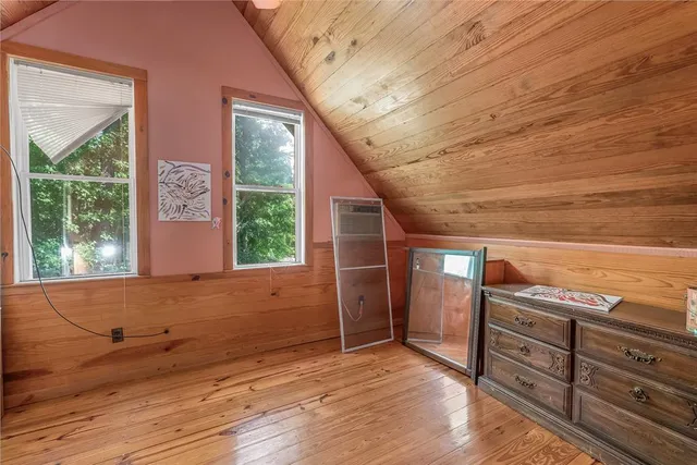 a view of a livingroom with wooden floor