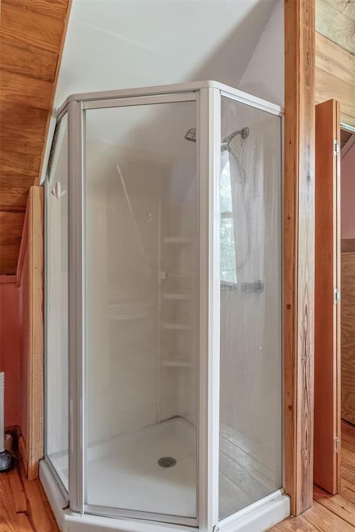 223 Razorback Lane Homer, LA 71040 - Photo 27 of 37 a bathroom with a glass shower door