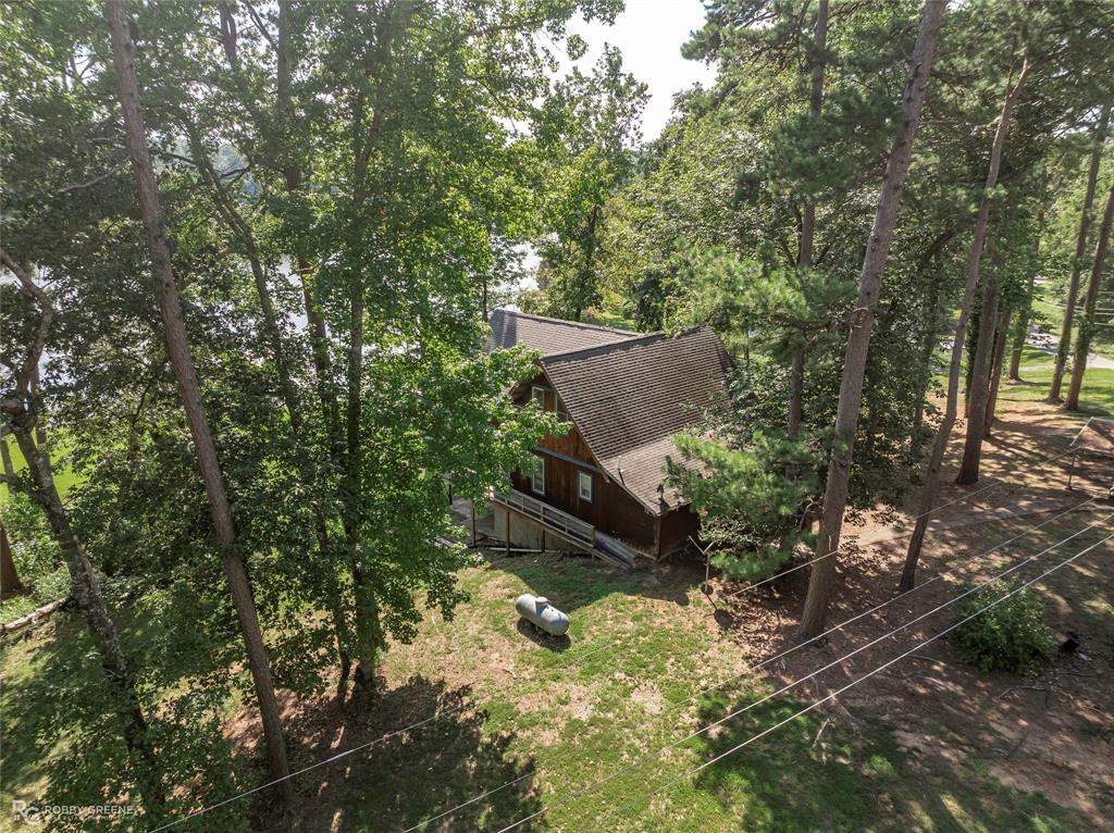 223 Razorback Lane Homer, LA 71040 - Photo 34 of 37 a view of a house with a yard