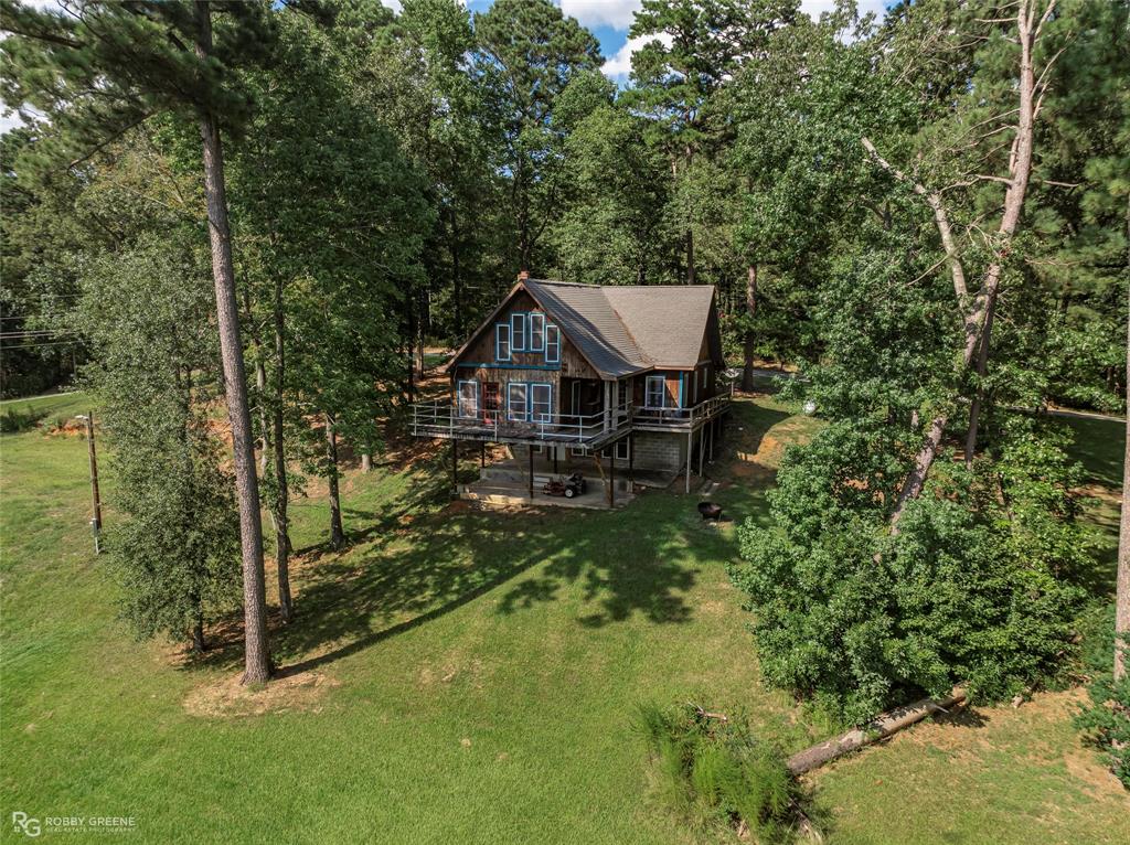 223 Razorback Lane Homer, LA 71040 - Photo 35 of 37 a view of a house with a yard
