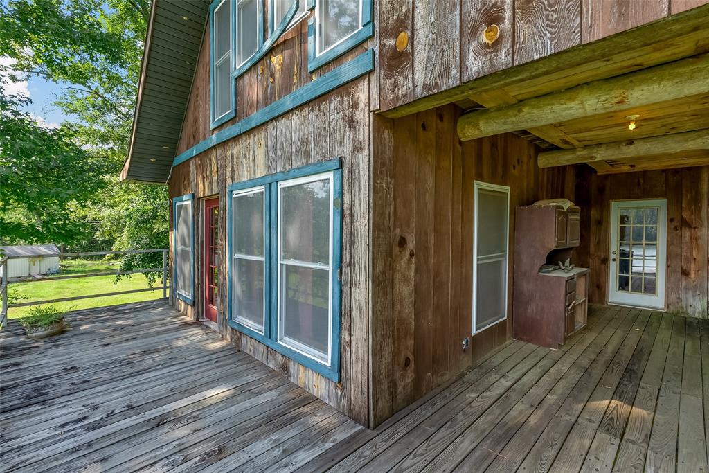 223 Razorback Lane Homer, LA 71040 - Photo 5 of 37 a view of a house with a patio