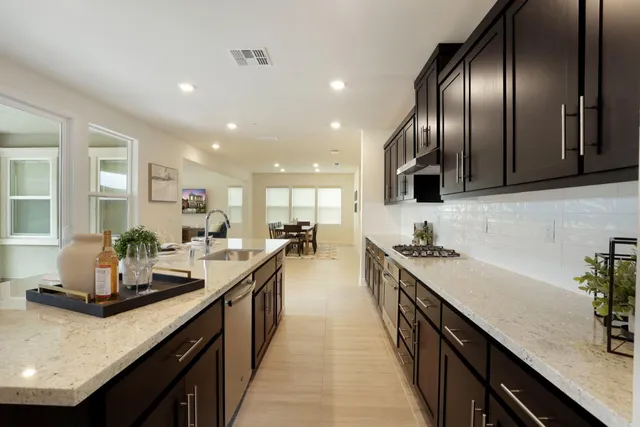 a kitchen with lots of counter space and a sink