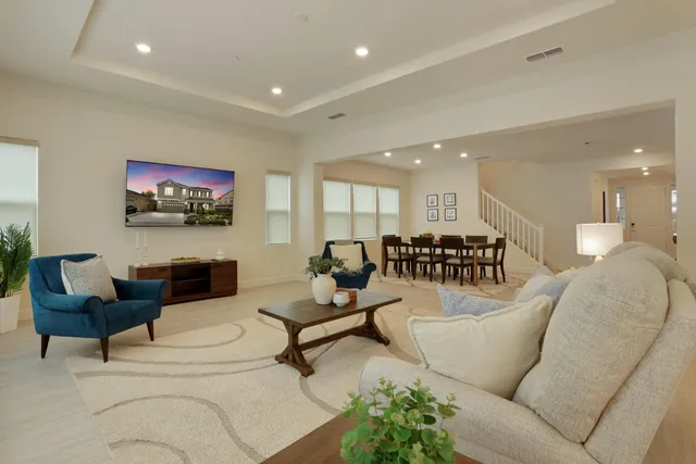 a living room with furniture and a couch