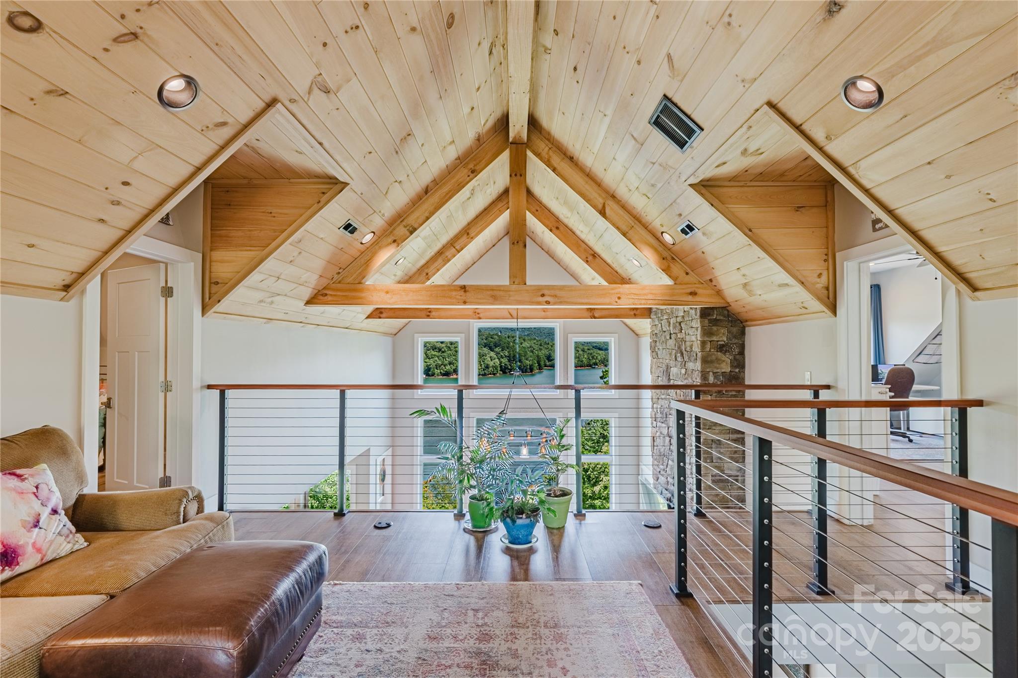 216 Alarka Point Bryson City, NC 28713 - Photo 18 of 47 a lobby with furniture and a potted plant