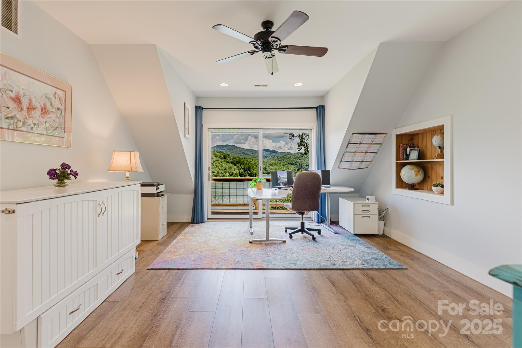 216 Alarka Point Bryson City, NC 28713 - Photo 20 of 47 a living room with furniture and a large window