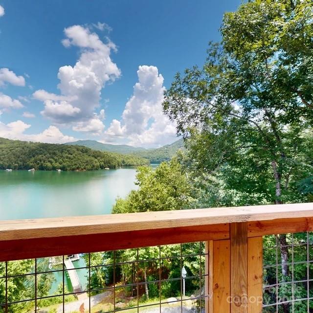 216 Alarka Point Bryson City, NC 28713 - Photo 23 of 47 a view of a lake from a balcony