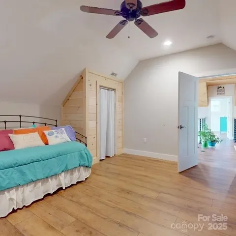 a view of a livingroom with wooden floor