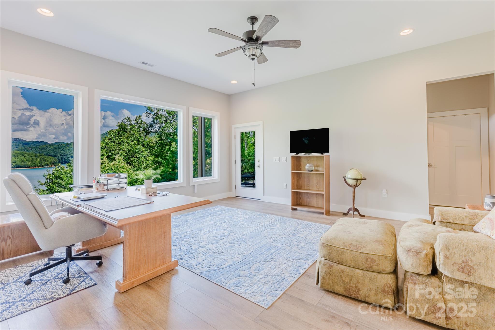 216 Alarka Point Bryson City, NC 28713 - Photo 31 of 47 a bedroom with furniture and a large window
