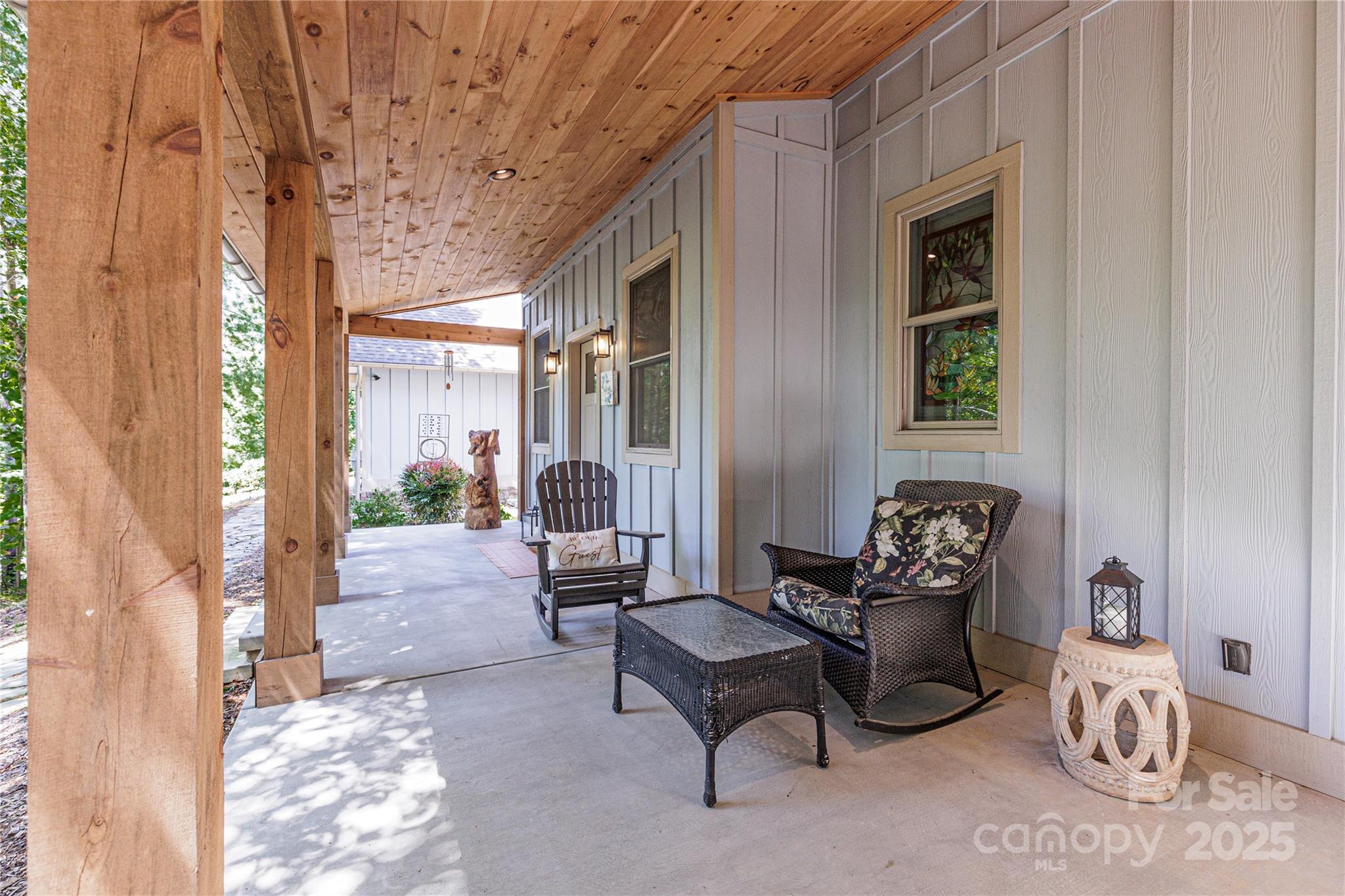 216 Alarka Point Bryson City, NC 28713 - Photo 39 of 47 a living room with furniture and a large window