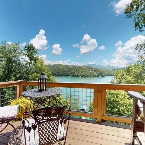 a view of balcony with furniture