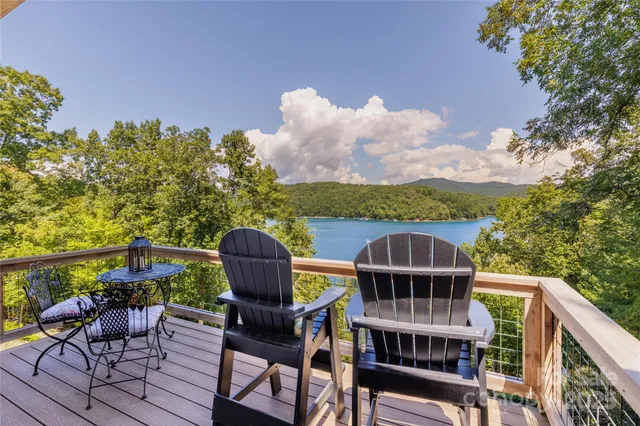 a front view of house with outdoor seating yard and outdoor seating