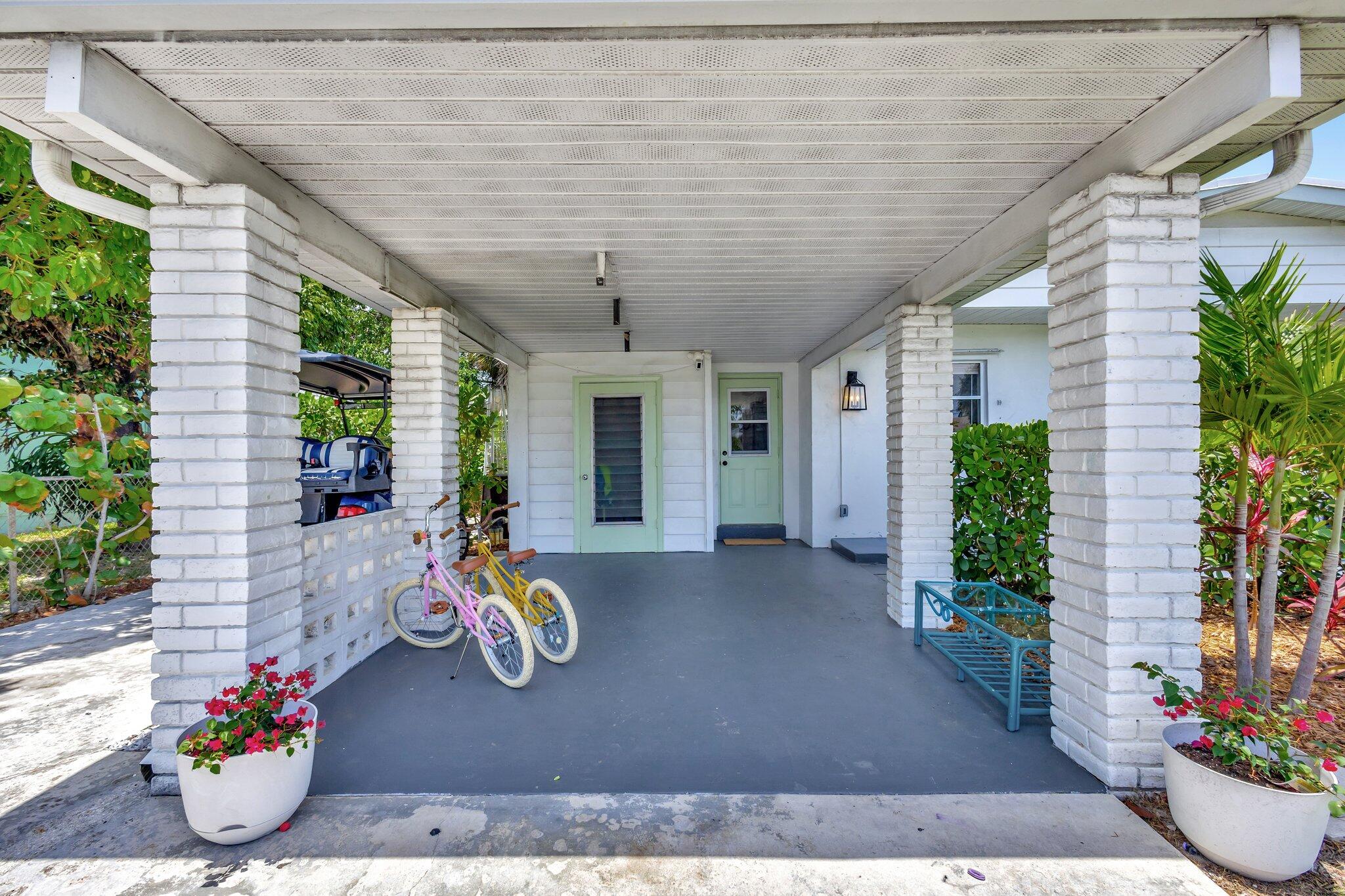 417 Inlet Road North Palm Beach, FL 33408 - Photo 32 of 52 Carport 2