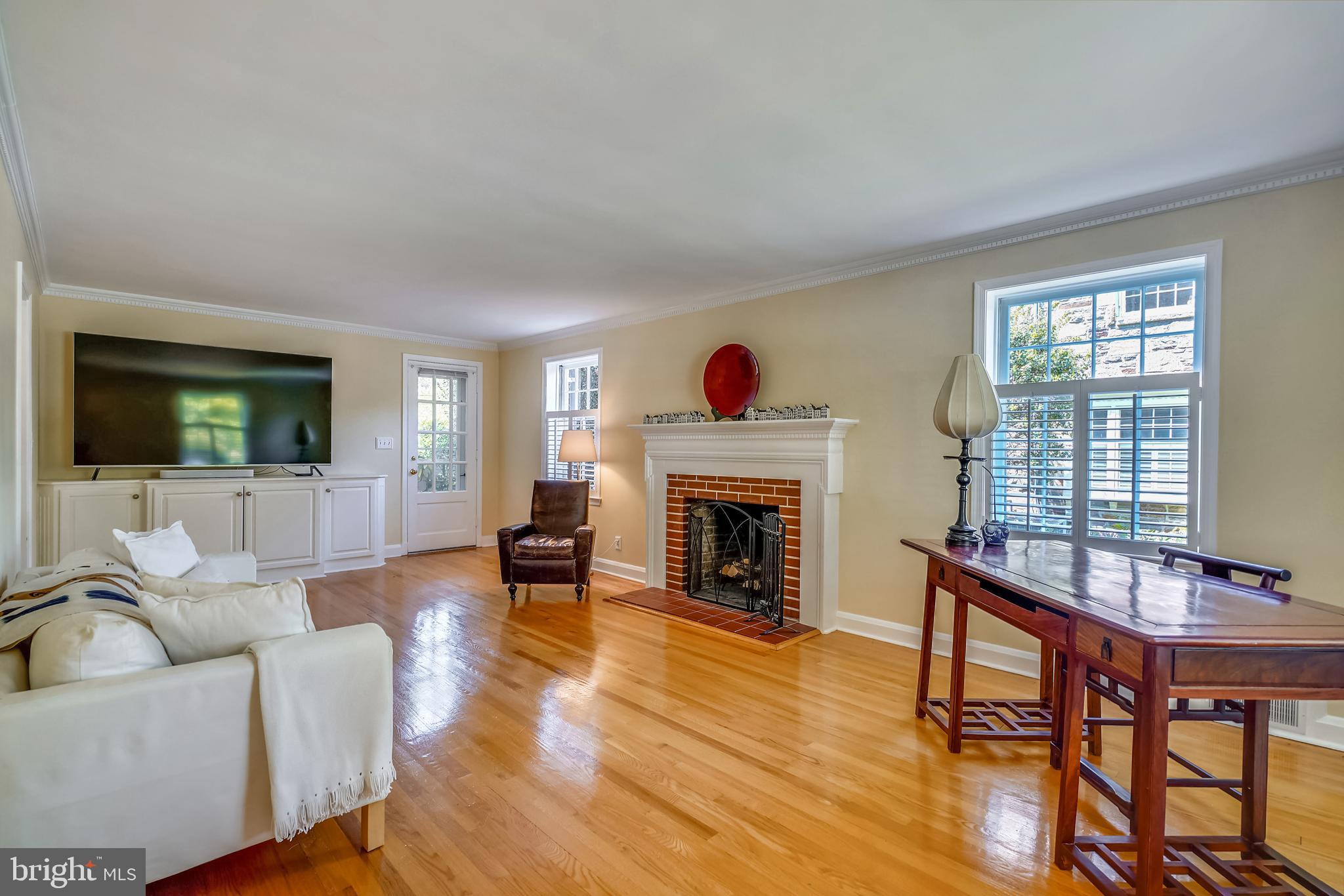 107 Croydon Road Baltimore, MD 21212 - Photo 2 of 25 Living Room with wood burning fireplace