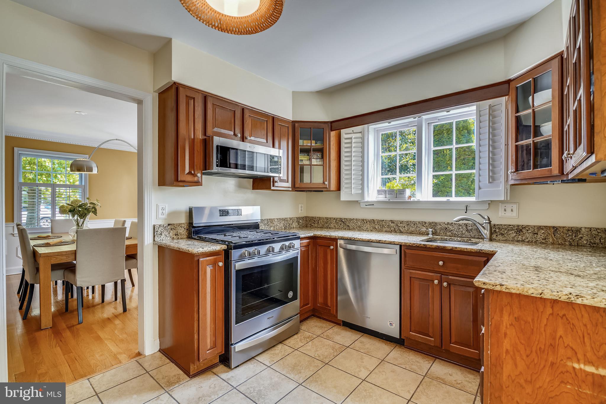 107 Croydon Road Baltimore, MD 21212 - Photo 7 of 25 Kitchen flows to Dining Room & Sunroom