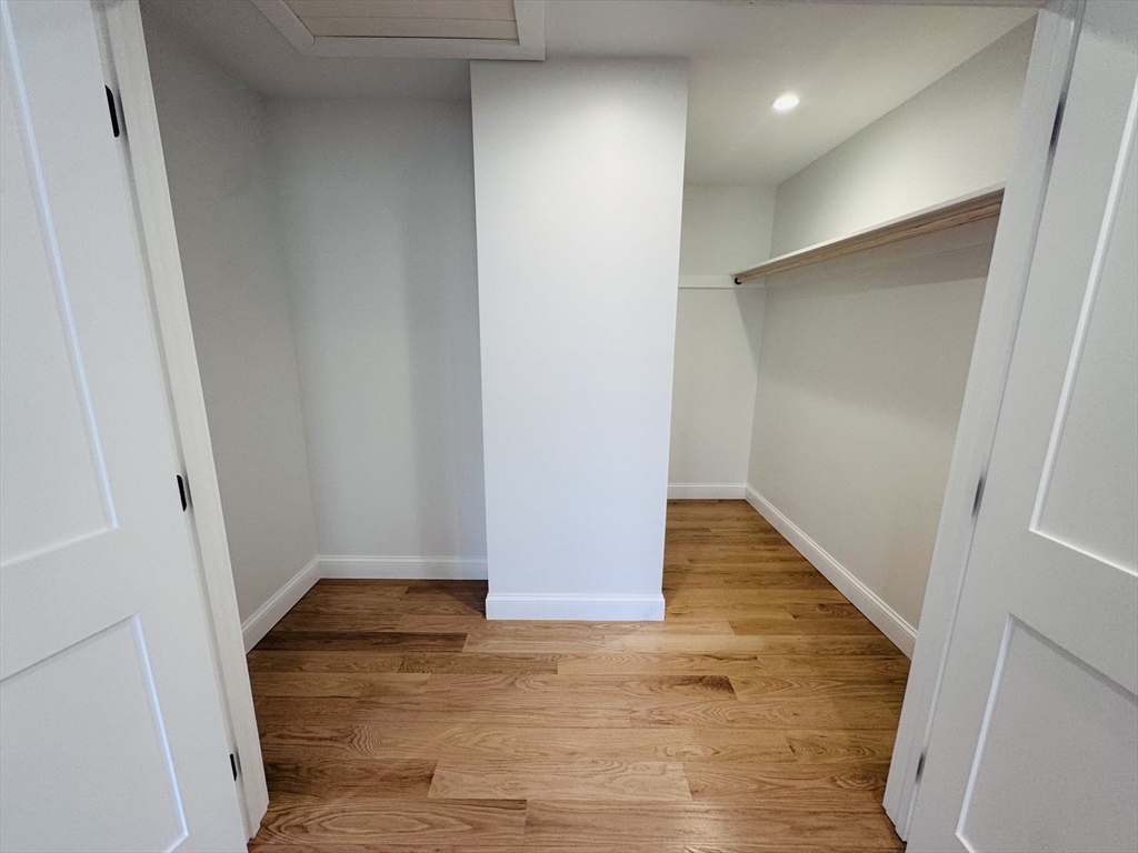 329 Tickle Road Westport, MA 02790 - Photo 35 of 42 an empty room with wooden floor and entrance