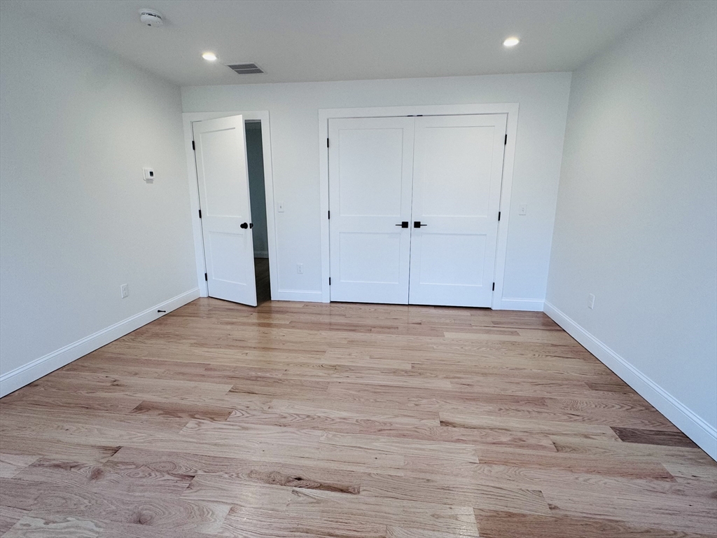 329 Tickle Road Westport, MA 02790 - Photo 37 of 42 a view of room with wooden floor