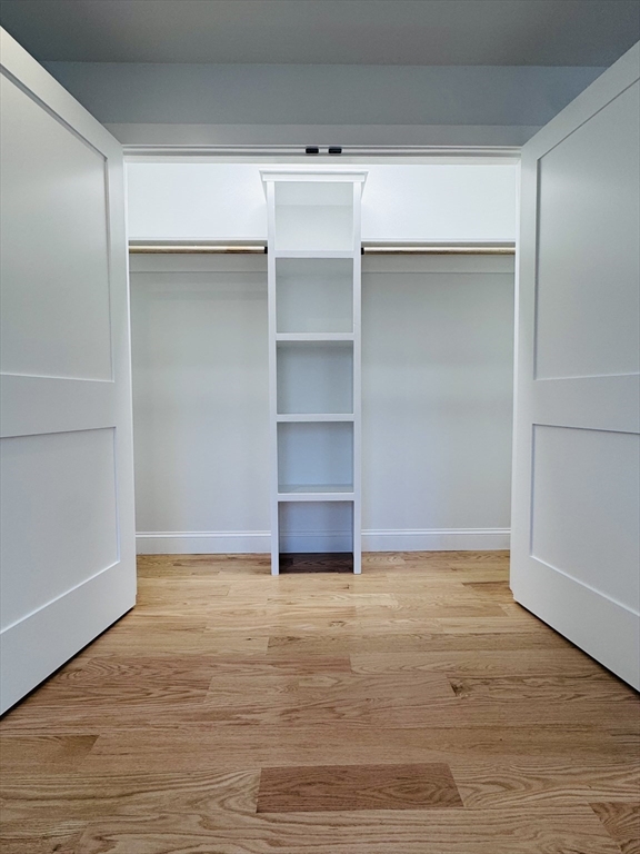 329 Tickle Road Westport, MA 02790 - Photo 38 of 42 a view of an empty room with wooden floor