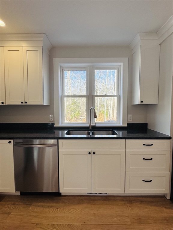 329 Tickle Road Westport, MA 02790 - Photo 4 of 42 a kitchen with stainless steel appliances granite countertop a sink a stove and a microwave