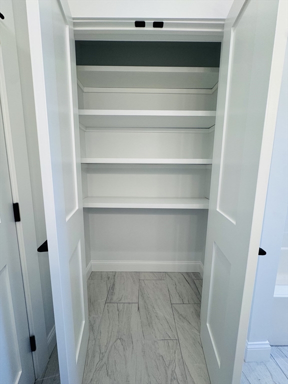 329 Tickle Road Westport, MA 02790 - Photo 42 of 42 a view of walk in closet with empty racks