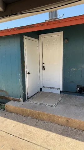 a kitchen with a sink and a stove