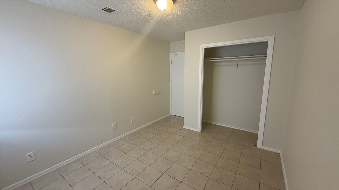 8210 Sam Rayburn Drive, Unit 103 Austin, TX 78753 - Photo 8 of 16 a view of an empty room
