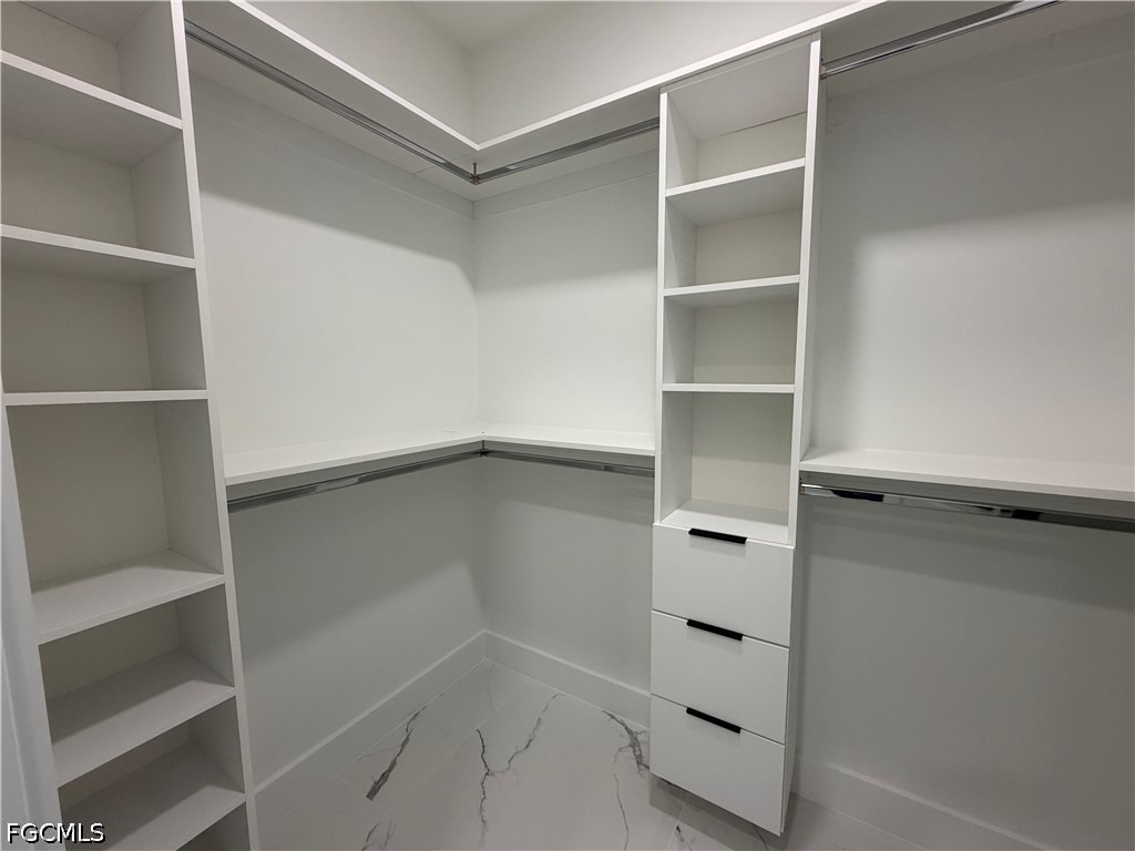 112 Northeast 6th Street Cape Coral, FL 33909 - Photo 15 of 37 a view of an empty walk in closet