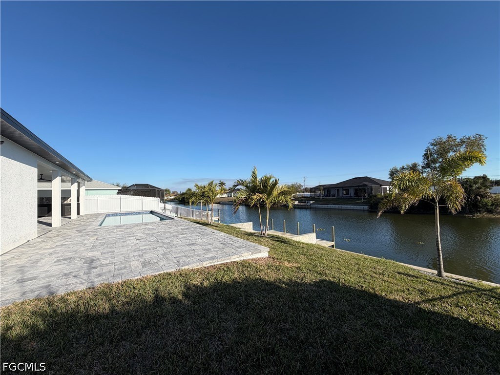 112 Northeast 6th Street Cape Coral, FL 33909 - Photo 30 of 37 a view of a house with a yard