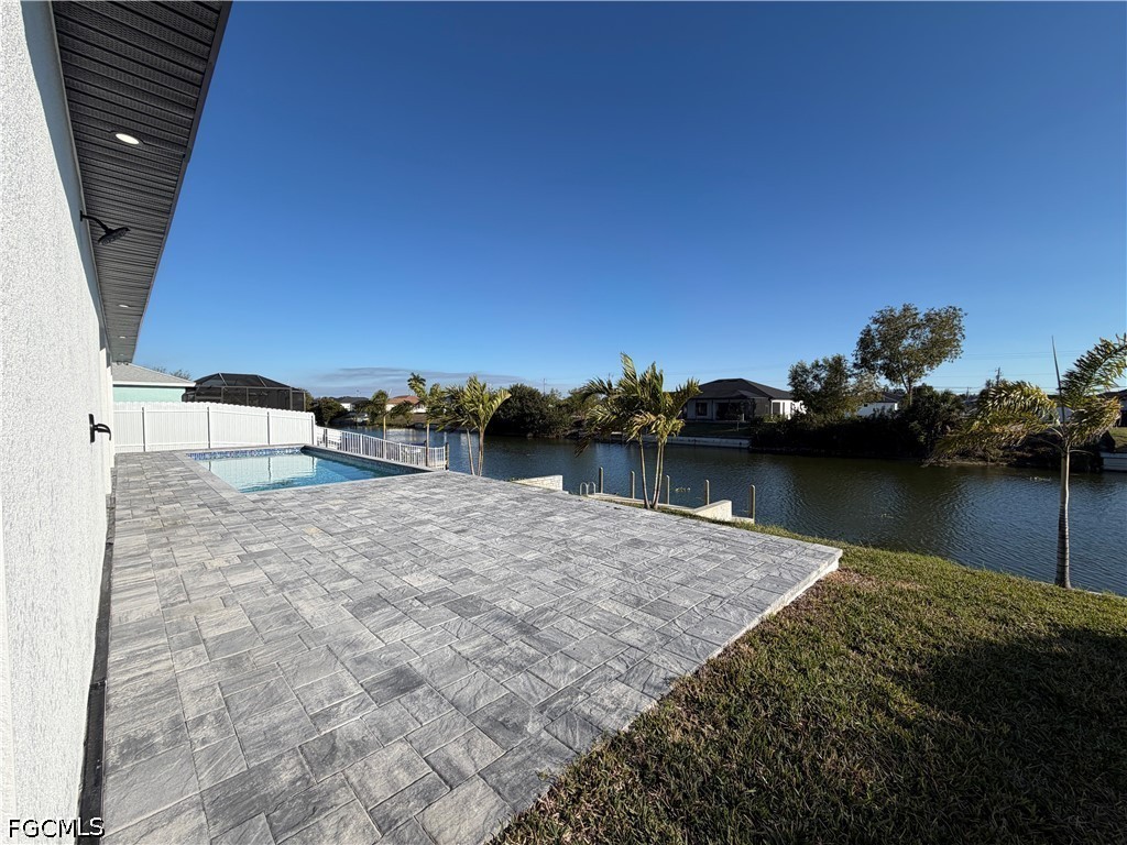 112 Northeast 6th Street Cape Coral, FL 33909 - Photo 31 of 37 a view of outdoor space and lake view