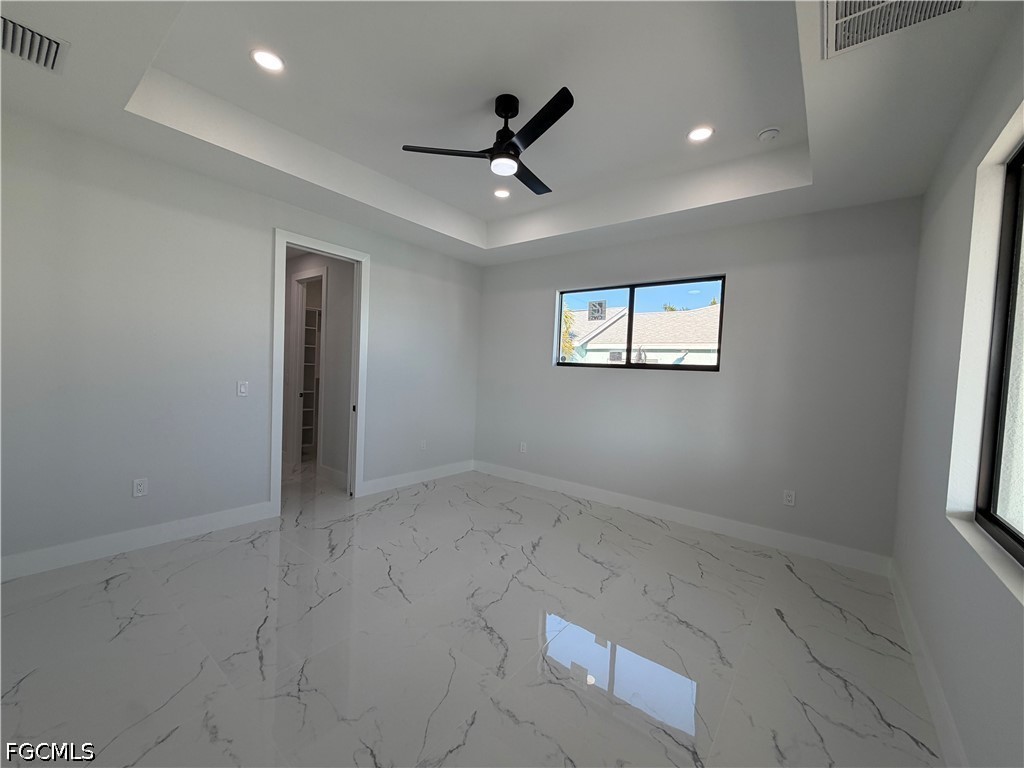 112 Northeast 6th Street Cape Coral, FL 33909 - Photo 9 of 37 a view of an empty room with a window