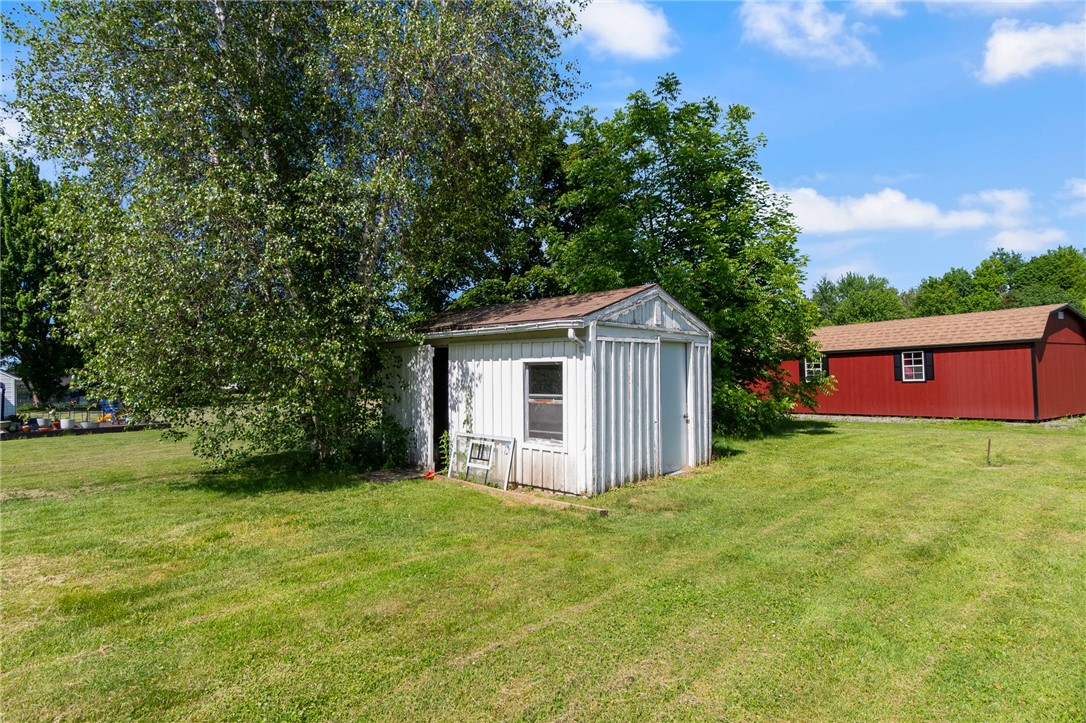 6170 Locust Street Williamson, NY 14589 - Photo 23 of 26 Keep your mower out in the shed- the yard is a gre