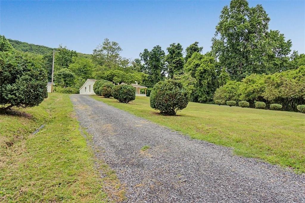 2115 King Road Dalton, GA 30720 - Photo 40 of 54 a view of a yard with a tree