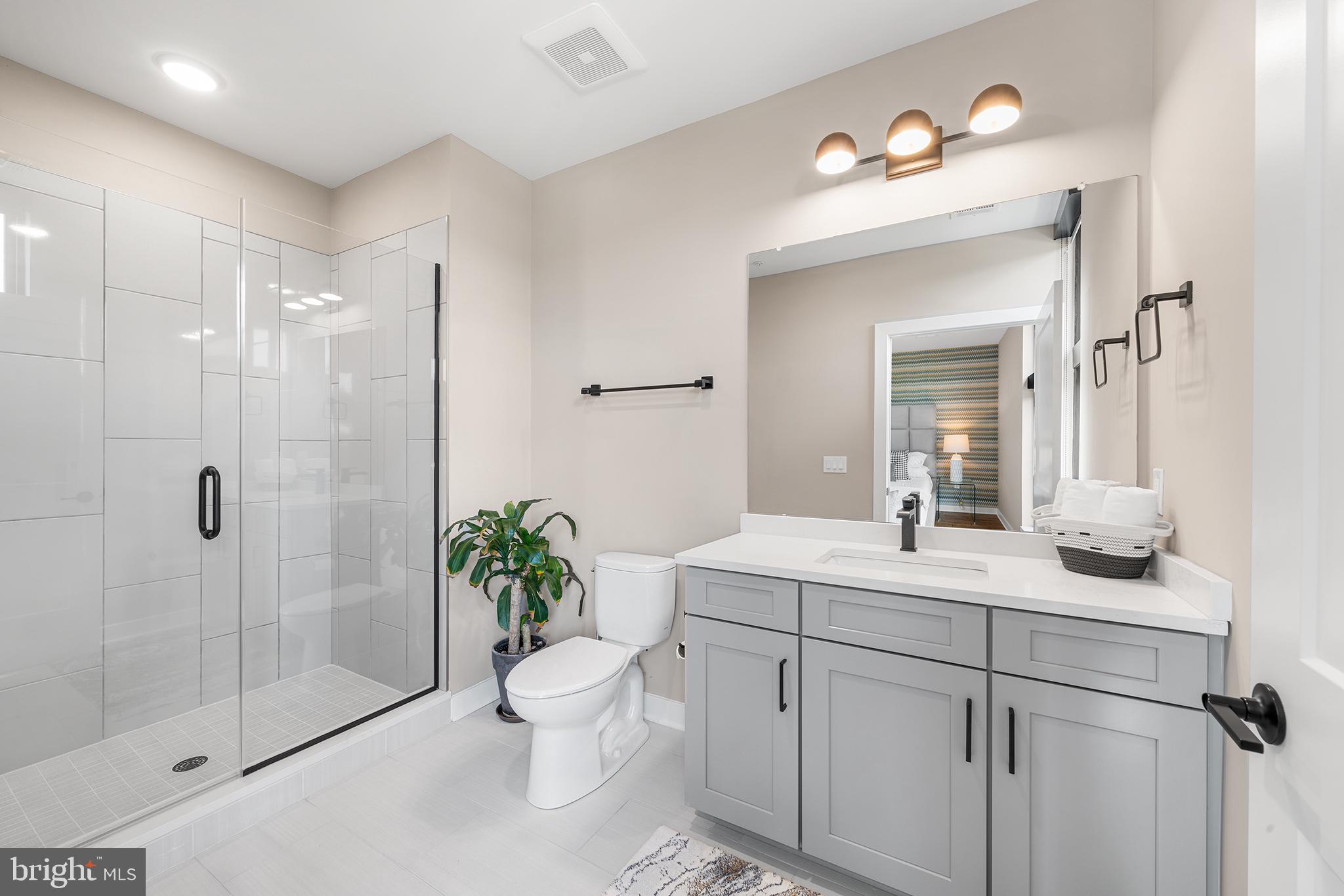 4535 Riverside Way Philadelphia, PA 19127 - Photo 28 of 43 a bathroom with a sink a toilet and shower