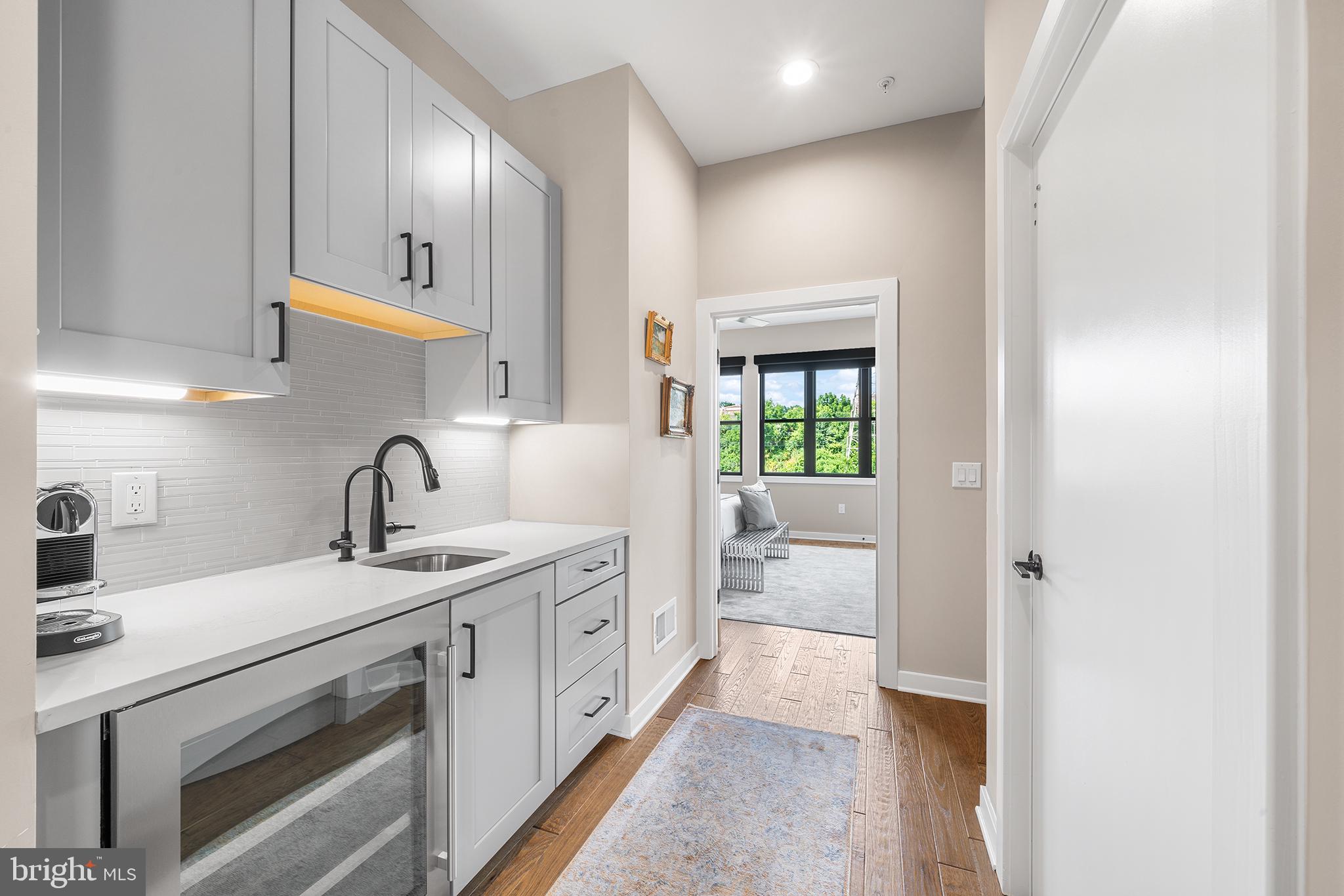 4535 Riverside Way Philadelphia, PA 19127 - Photo 33 of 43 a view of a kitchen with a sink and wooden floor