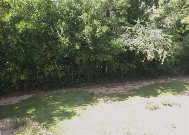 a view of a lake from a yard