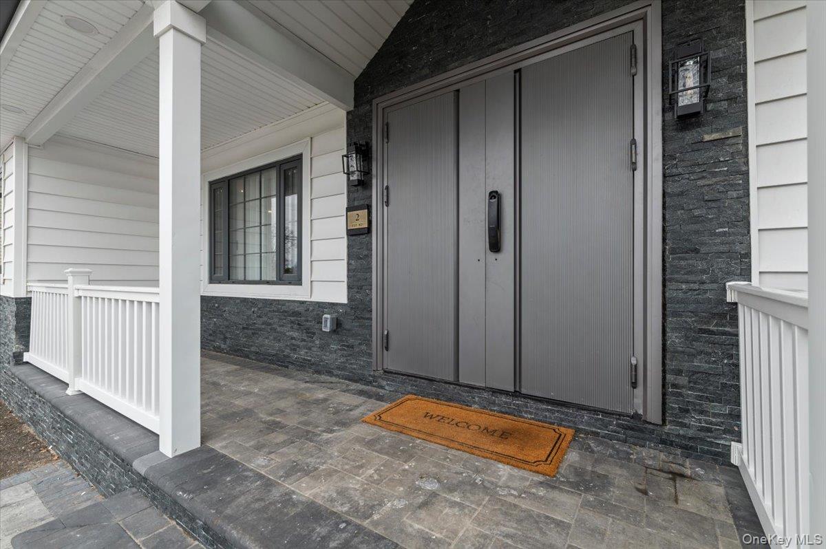 2 Elf Road Syosset, NY 11791 - Photo 2 of 38 a view of an entryway door