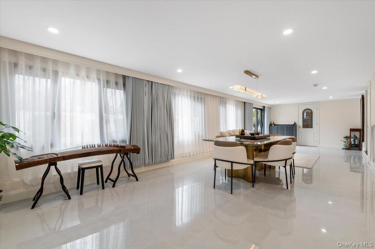2 Elf Road Syosset, NY 11791 - Photo 30 of 38 a view of a dining room with furniture and a window